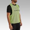 Kipsta two-way football training vest for adults - yellow and blue